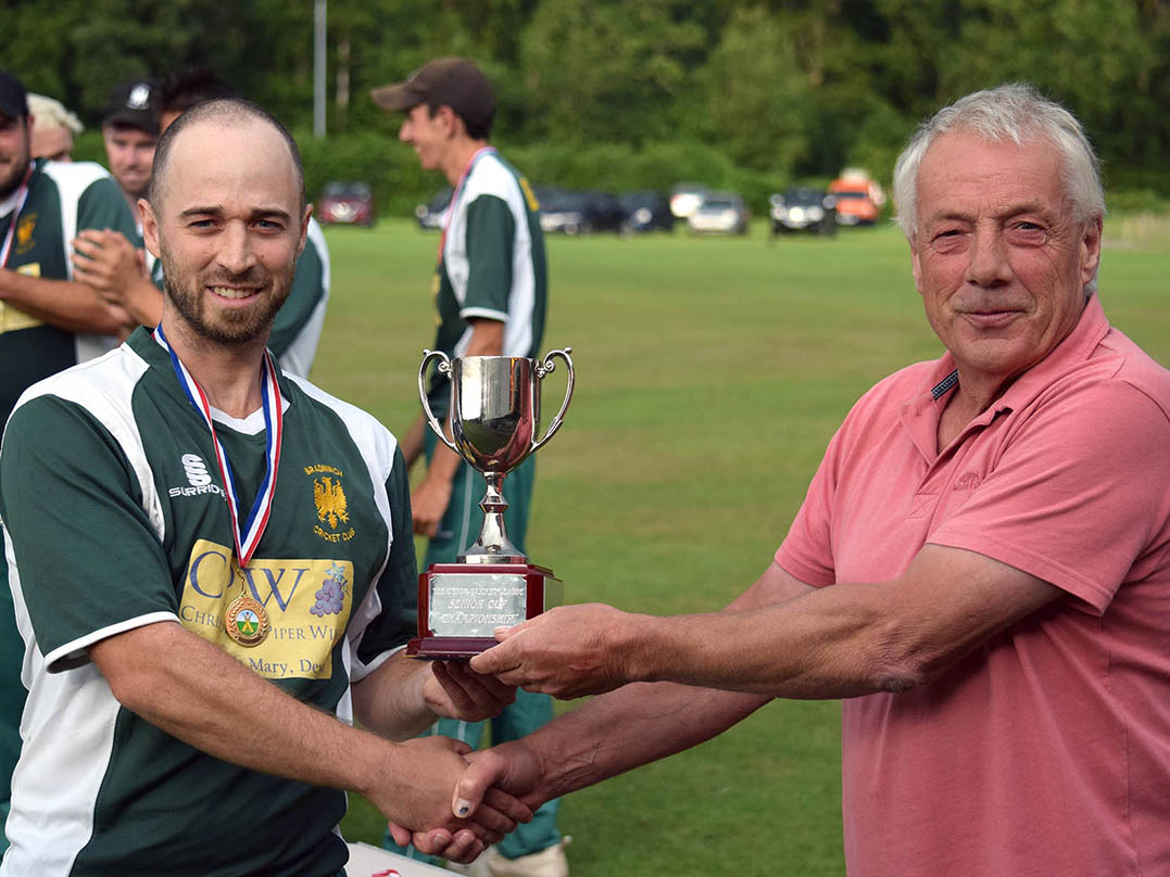 Gary Chappell (left) collecting the Sunbelt Rentals Devon Cup from Tolchards DCL chairman Nick Rogers