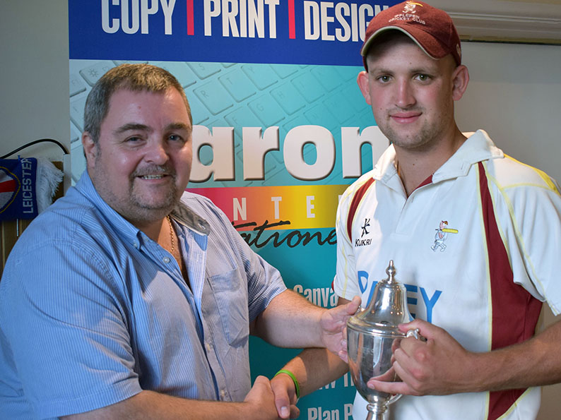 Sponsor Marcel Massey hands the Aaron Printers Cup to winning captain Sam Wakeham<br>credit: Conrad Sutcliffe