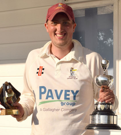 Ipplepen captain Harry Lewis with the Brock man Cup and his own memento of the win