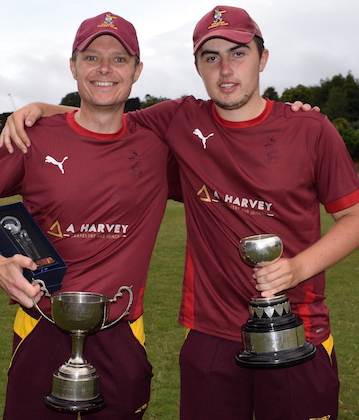 Ipplepen's hat-trick hero Steve Bowden (left) and skipper George Tapley show off their silverware