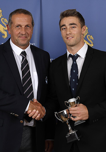 Keith Donohue (left) presenting Zak Bess with the Devon player of the year award in 2016