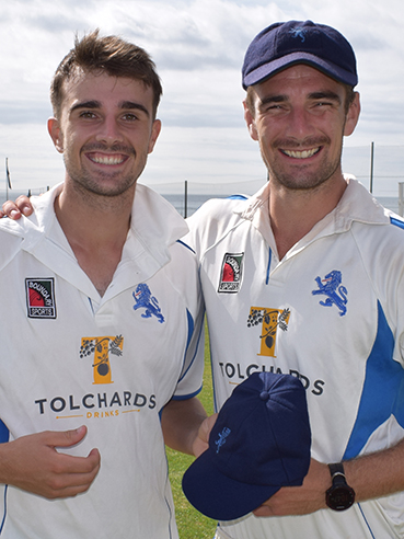 Ben Green (left), who received his county cap from skipper Josh Bess before the first day of the match against Dorset