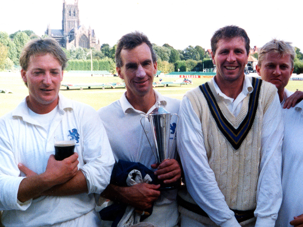 Julian Wyatt (left) and Nick Gaywood (right) flank winning captain Peter Roebuck on the balcony at Worcester after Devon's win over Cambridgeshire in the 1994 MCCA play-off game<br>credit: Conrad Sutcliffe