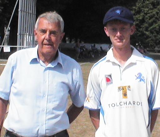 Devon chairman Neil Gamble (left) presents Jamie Stephens with his county cap during the game against Herefordshire at Plymouth