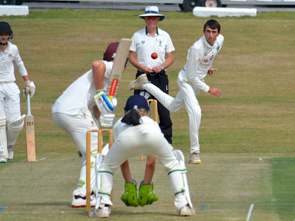 Bradninch & Kentisbeare spinner Josh Farley bowling to Exeter's Eddie Steele. Farley finished with four wickets 
