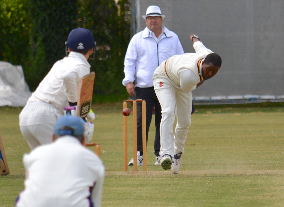 South Devon paceman Mali Marshall bowling to Paignton opener Arthur Rae