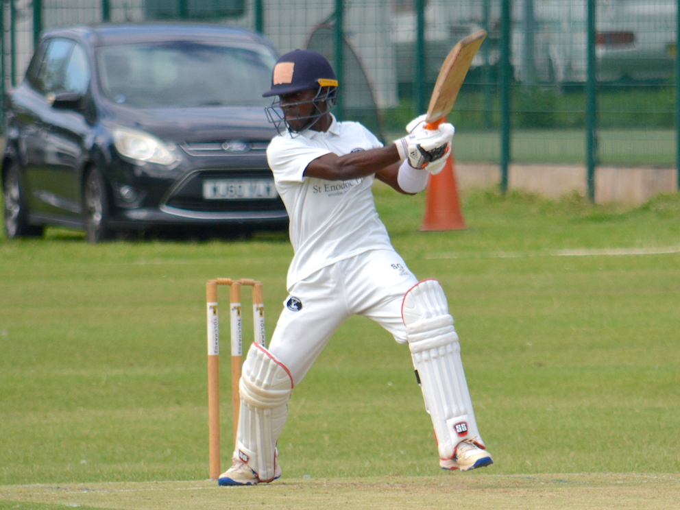 Bridestowe's Shaq Glasgow lashes out during his match-winning knock against Torquay & Kingskerswell<br>credit: Conrad Sutcliffe - no re-use without copyright owner's consent