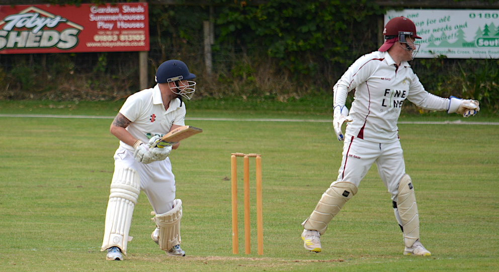 Abbots' batter Aron Owen and PCS&R keeper Jonny Keiller glance towards the slips where Alan Smith has just taken the catch that dismissed the former