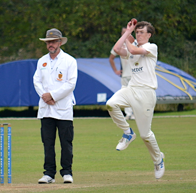 Ottery's Ben Major bowling the final over of the Braunton innings
