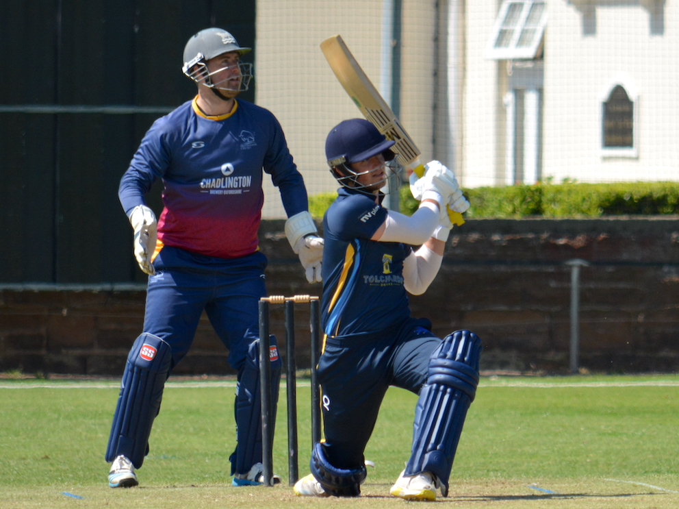Devon's Ben Privett smashing Oxfordshire spinner Max Mannering for six