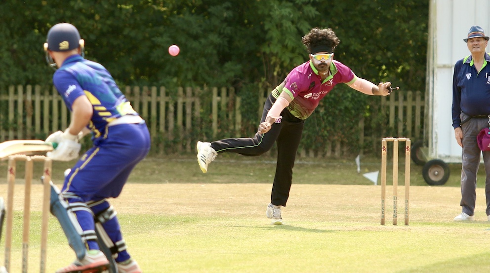 Cullompton's Akshay Bharadwaj bowling to Kilmington's Joel Seward