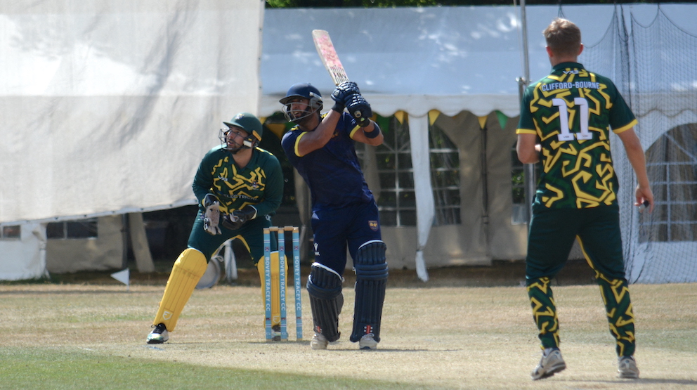 Plympton captain Harry Kandampully sets about the Bovey Tracey bowling