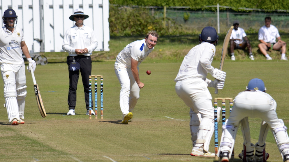 Devon seamer Matt Skeemer coming down the hill at Cornwall's Jake Rowe