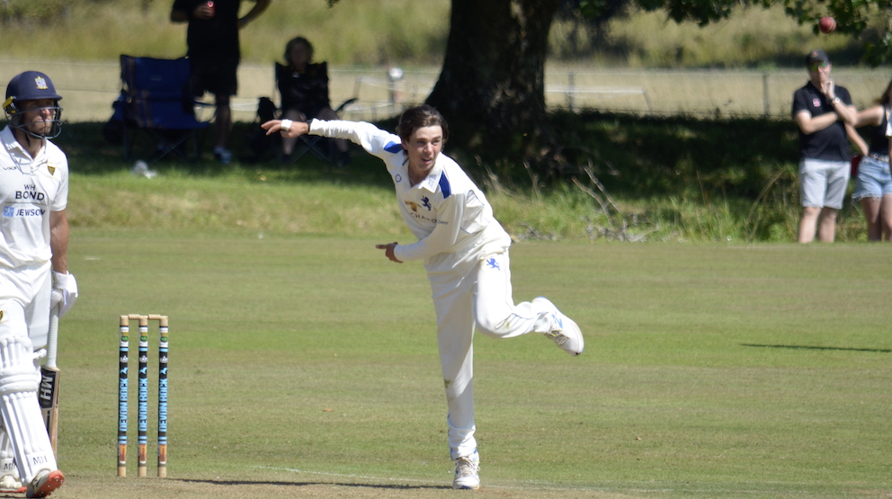 Callum Harvey runs past Cornwall's Will MacVicar as he comes in to bowl