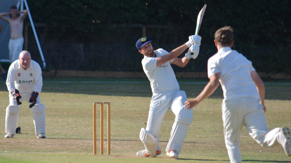 Ivybridge captain Josh Zimmerman plants the Abbotskerswell bowling into the next post code