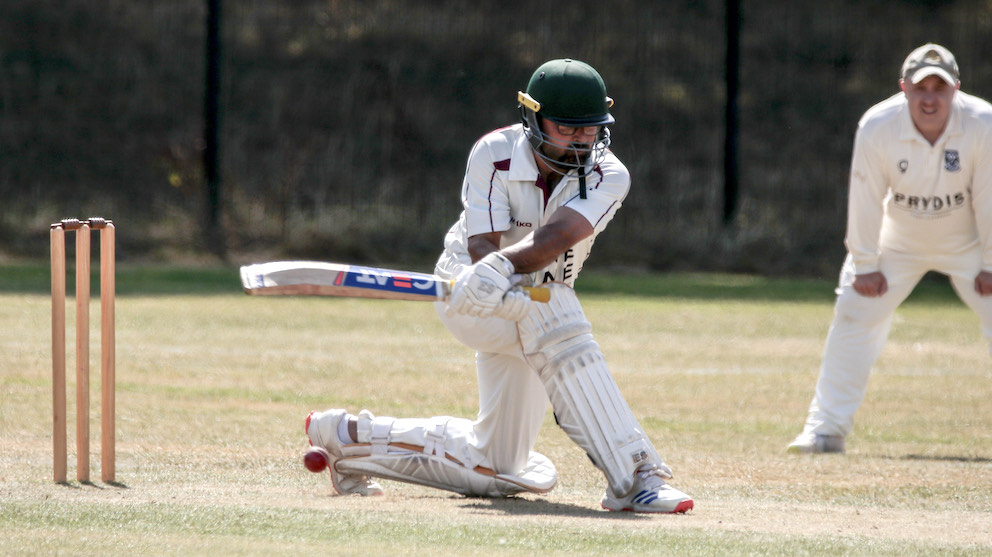 Civil Service batter Malik Wasim deploys the sweep shot against Kenn 