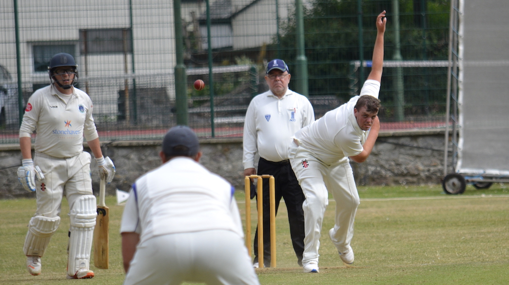 South Devon's Sean Andrews bowling to Ashburton's Lloyd White