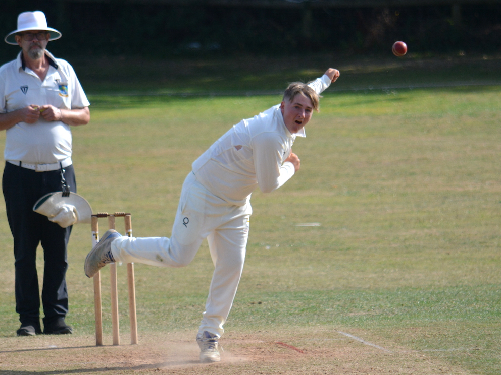 Ipplepen's Warrick Green bowling against Bideford
