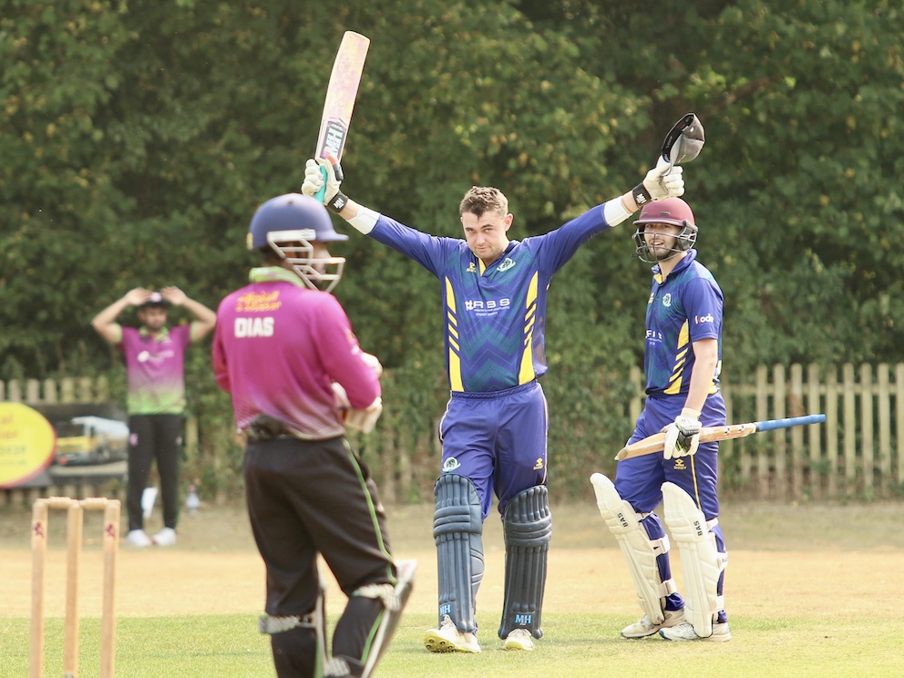 Kilmington's Josh Cann celebrates reaching a century against Cullompton