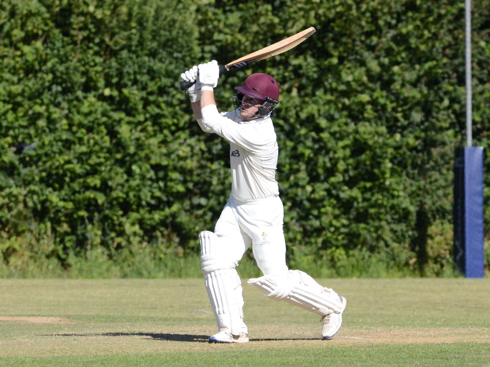 Ipplepen opener Marcus Gadie belts the Abbotskerswell bowling towards the boundary, He made 28