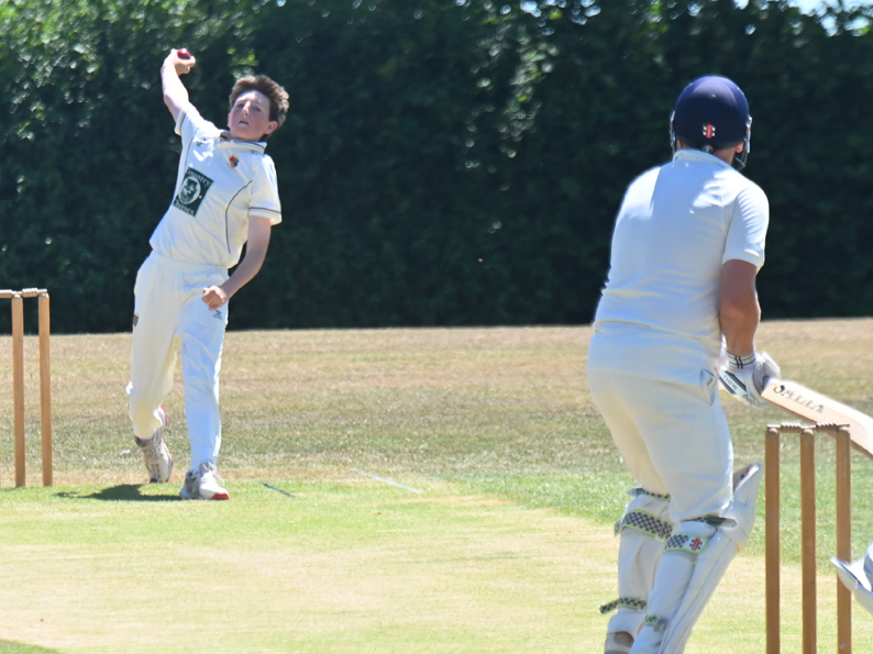 Tavistock's Nelson Stanley wheeling away against Abbotskerswell 2nd XI