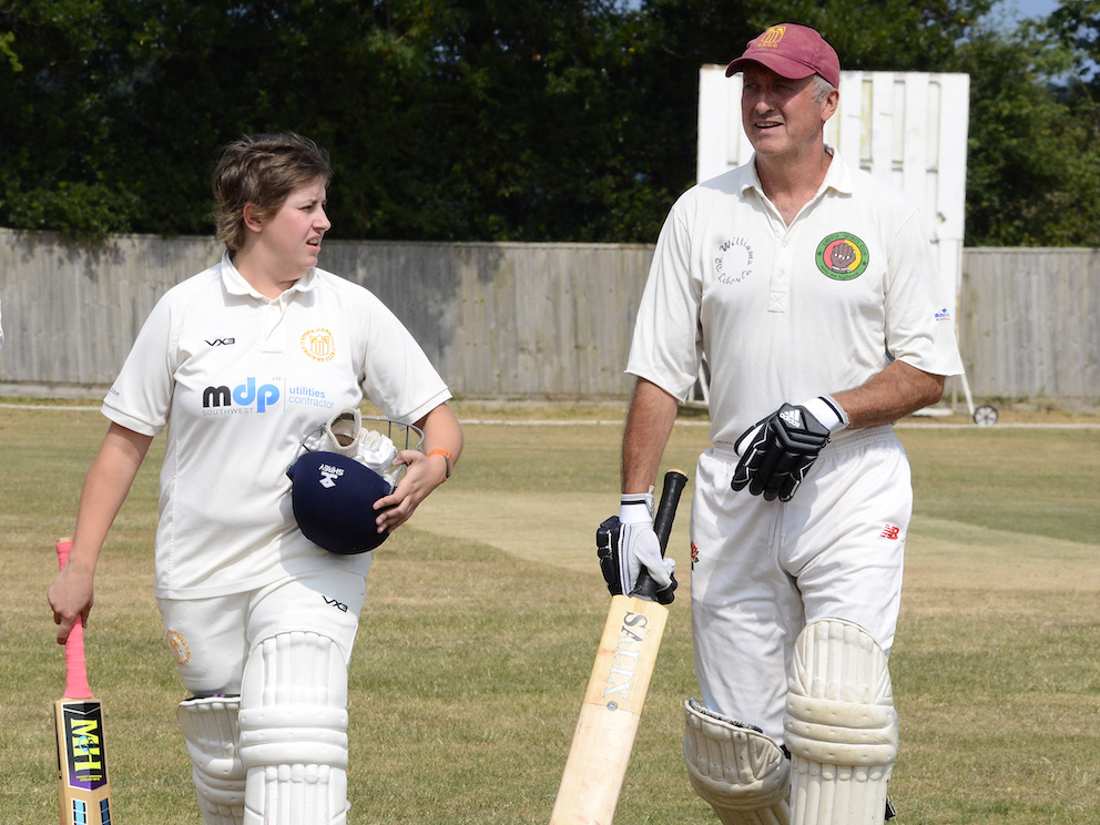 Stoke Gabriel tail-enders Harriet Duke (left) and dad Pat (right) walk off together at the end of the innings