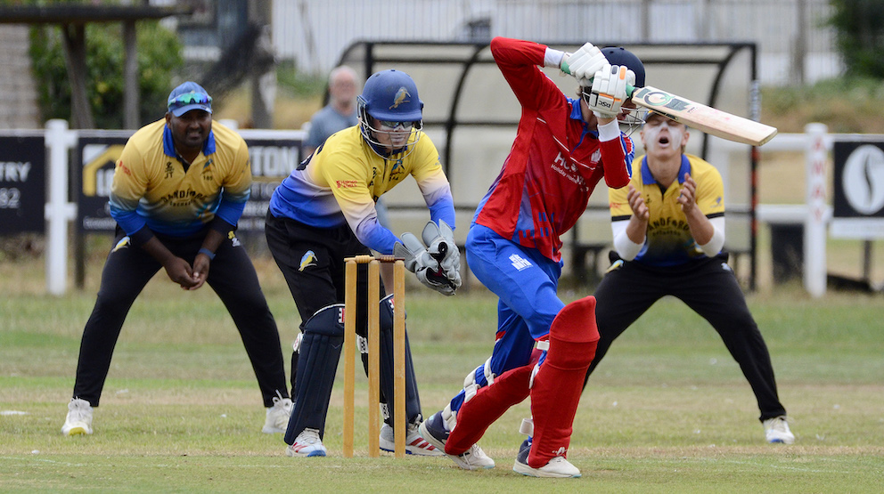 Sandford slip fielder Harry Southgate winces as Paignton opener Brenton Pedley plays and misses!