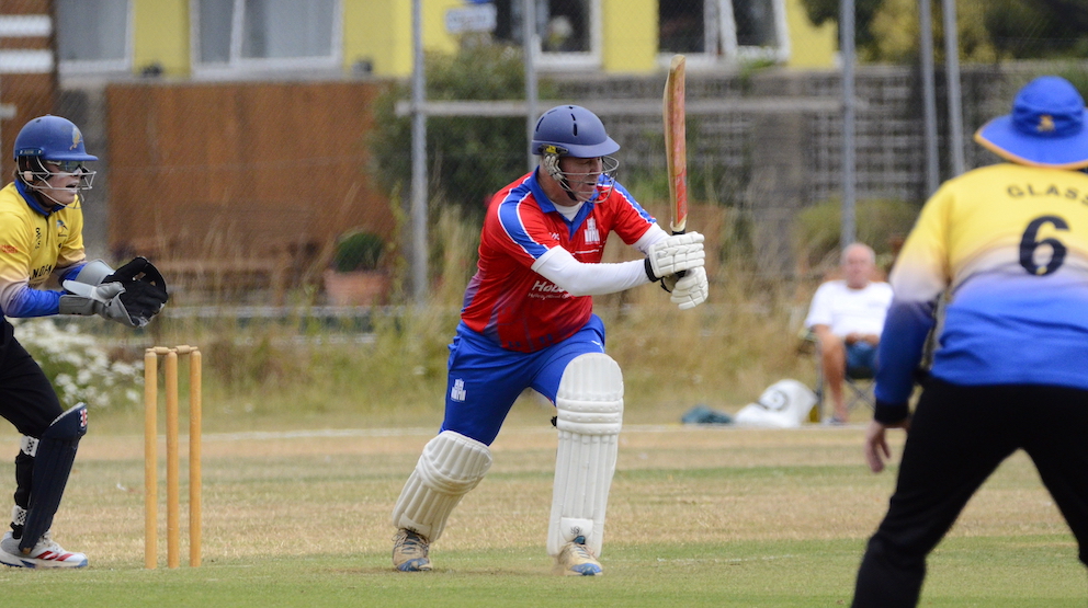 Paignton's Neil Hancock getting on with it against Sandford