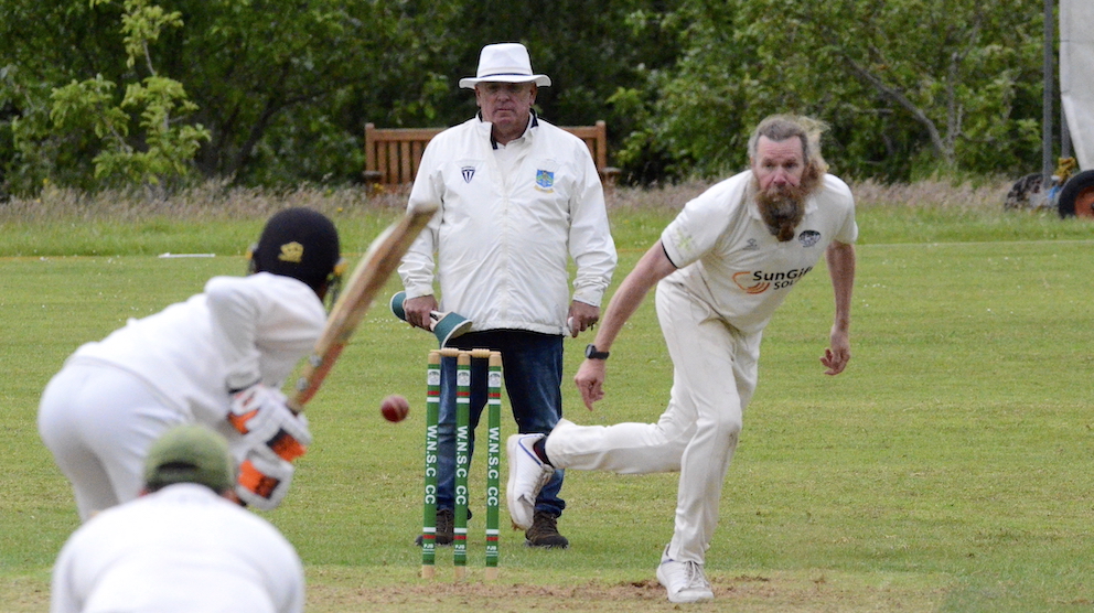 Woodbury & Newton St Cyres seamer Peter Moison working with the new ball against North Devon
