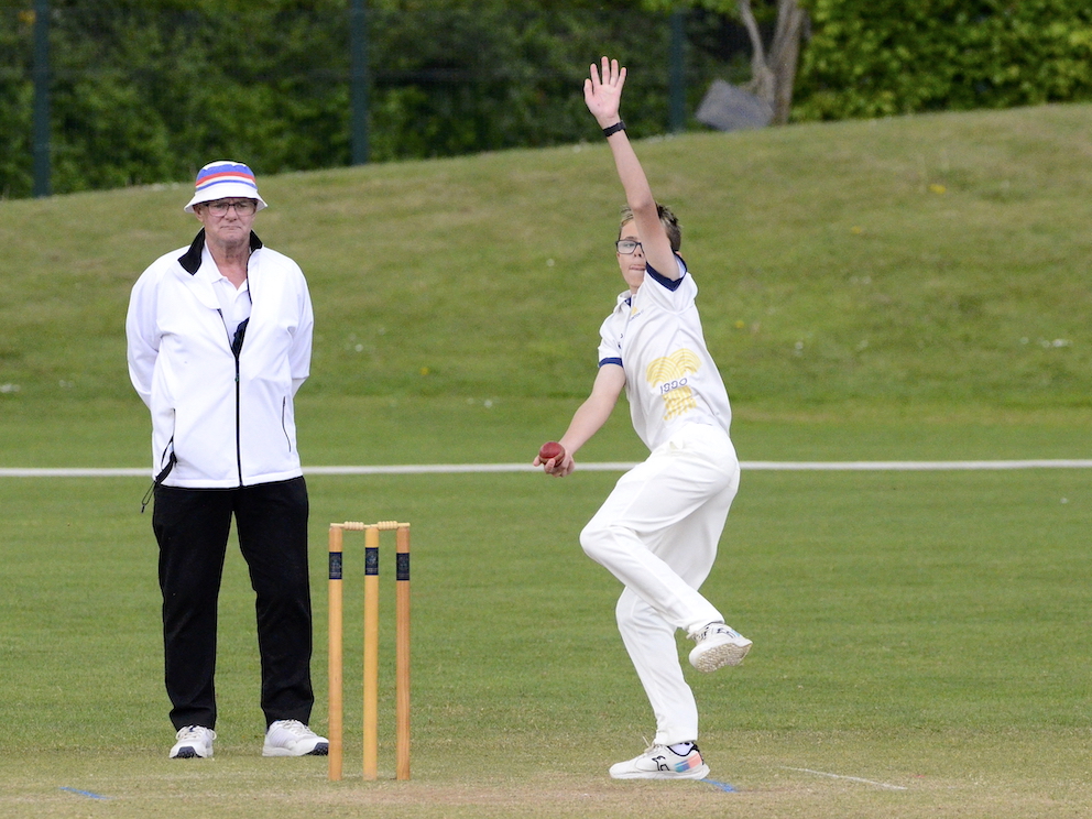 Braunton's up-and-coming spinner Paddy Halton bowling against Topsham
