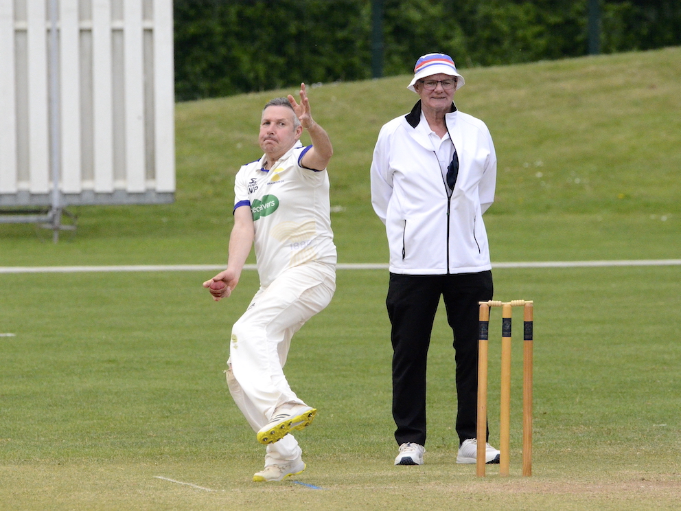 Andrew Paddison twirling away for Braunton against Topsham