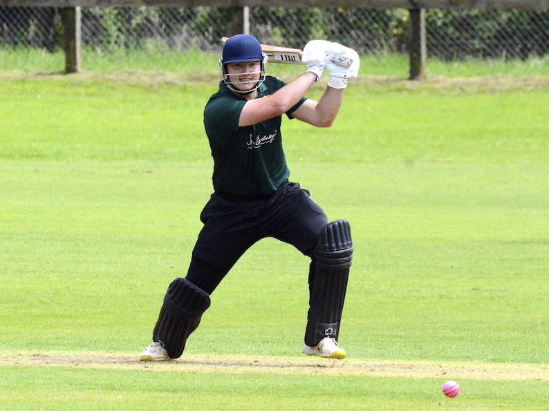 Cornwood captain Matt Skeemer slaps the Exeter bowling through the covers