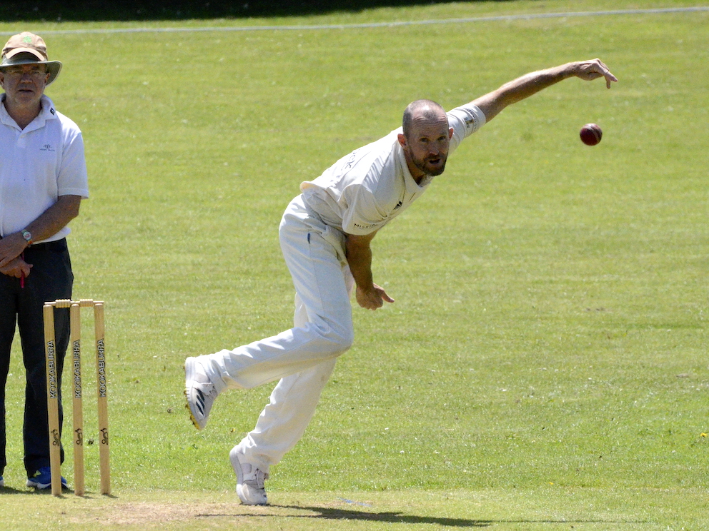 Barton's Matt Needham lets fly from the Cricketfield Road end during the 98-run defeat by Yelverton
