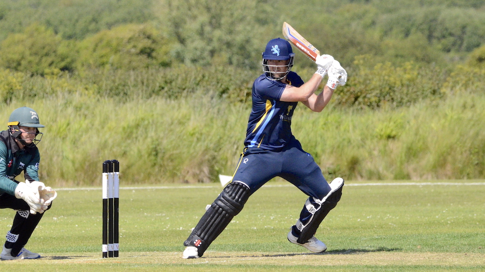 Devon's Sam Read takes on the Wiltshire bowling and wins!