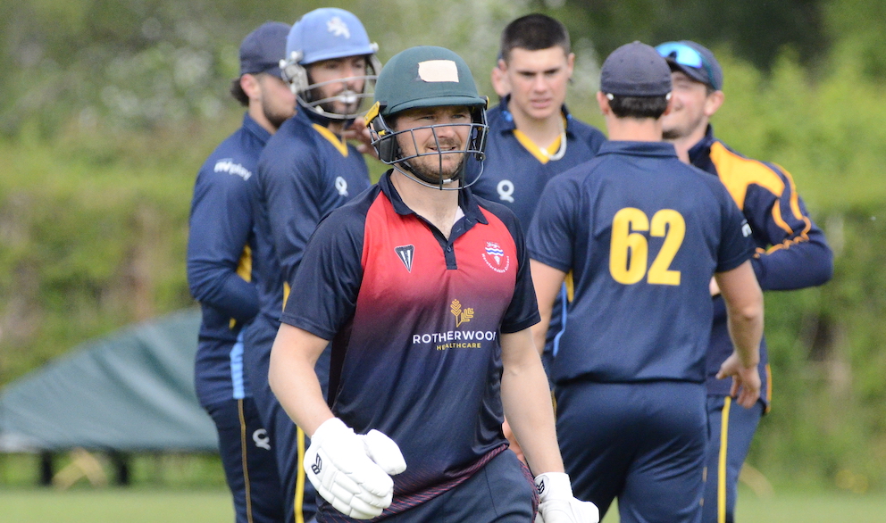 Devon spinner Matt Whalley is the centre of attention in the background after dismissing Herefordshire danger man George Rhodes<br>credit: Conrad Sutcliffe - no re-use without copyright owner's consent Devon spinner Matt Whalley is the centre of attention in the background after dismissing Herefordshire danger man George Rhodes<br>credit: Conrad Sutcliffe - no re-use without copyright owner's consent
