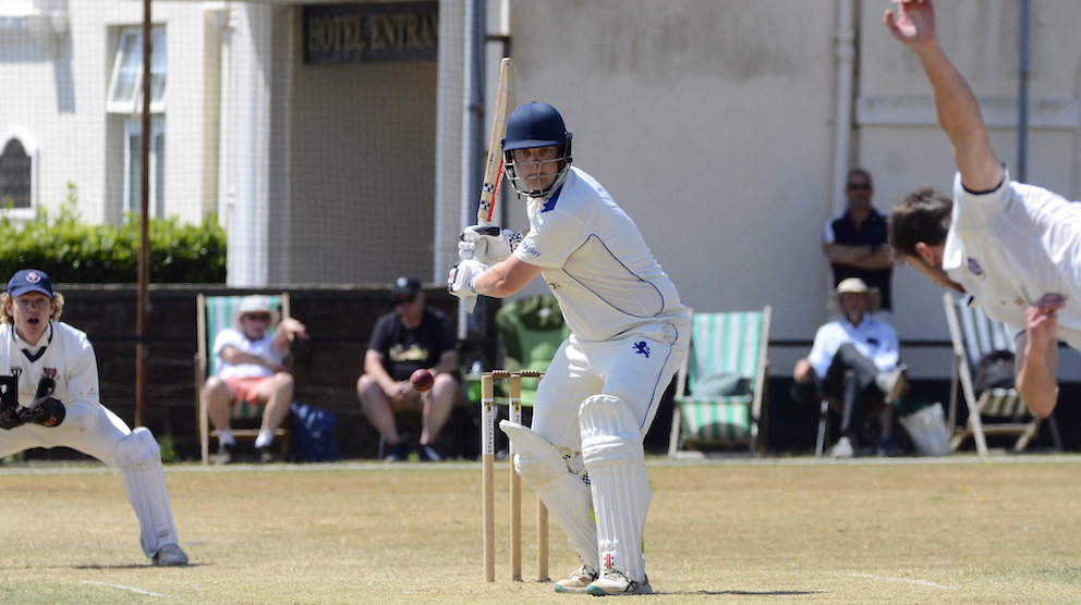Devon batsman Lawrence Walker takes on Herefordshire paceman James Rudge