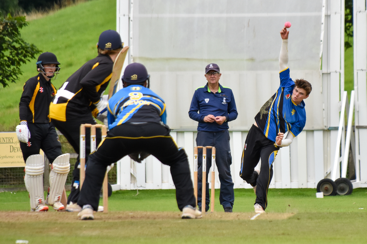 Luke Medlock (Paignton CC) bowling against Cornwall at Sandford CC