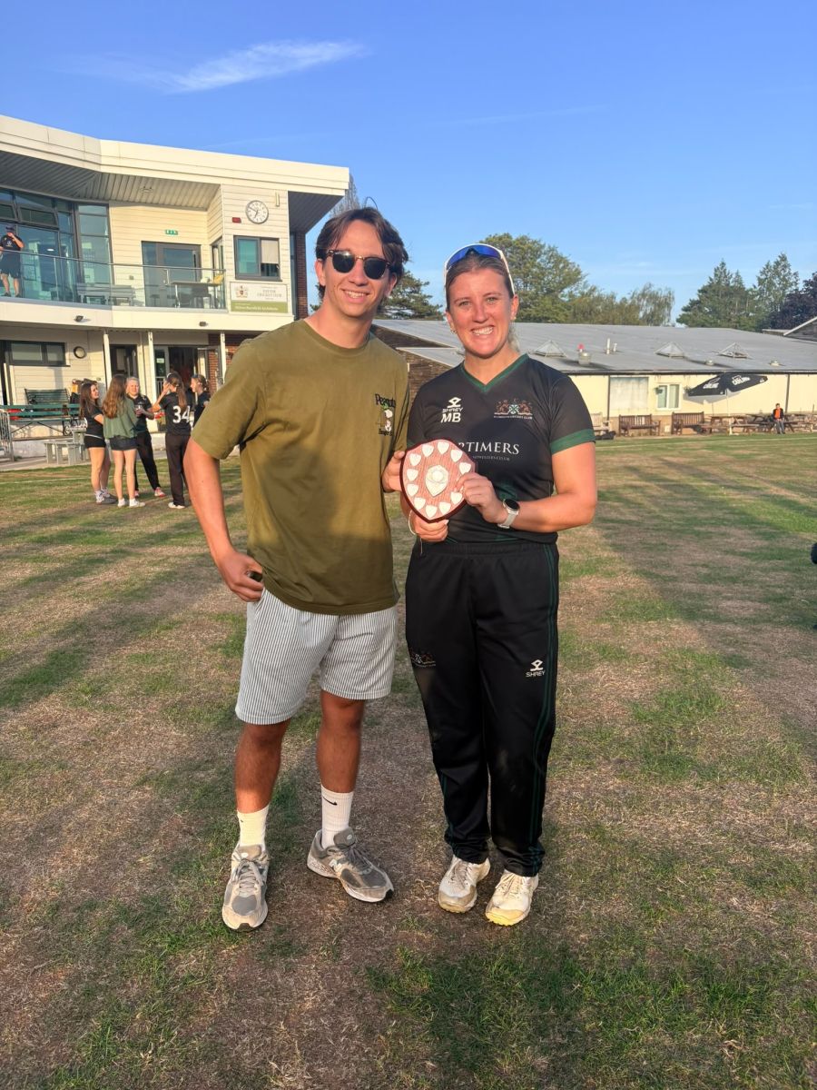 Missy Banks presented with her Division One Batting Award by Ted Haffenden