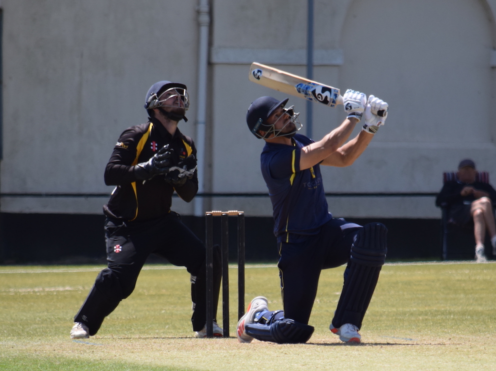 Batter Dan Goodey and Cornwall keeper Alex Bone watch as another six disappears over the mid-wicket boundary<br>credit: Conrad Sutcliffe