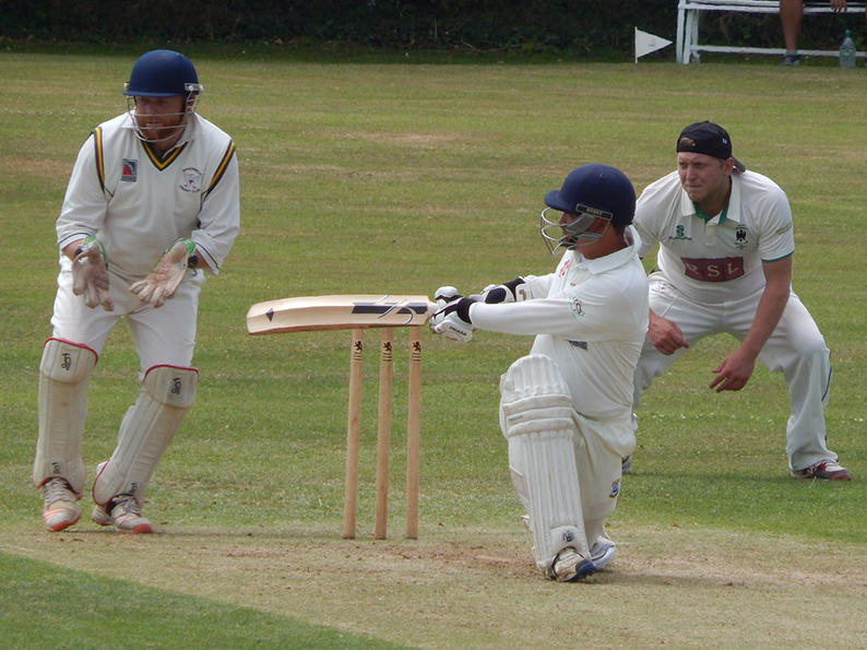 Tim Piper (left) and Ross Acton get a close-up view of Justin Yau's sweep shot