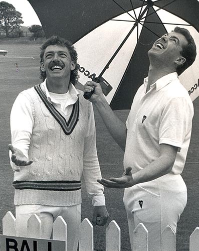 Julian Smith (left) and Exmouth opposite number John Tierney during a rain break in the 1991 season