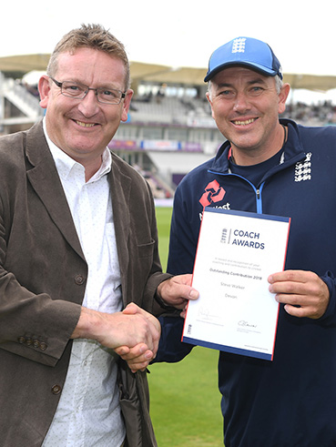 Steve Walker (left) receiving his award at the Ageas Bowl