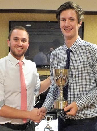 Bovey's outgoing captain Sam Hickinbottom (left) handing over the 1st XI bowling award to Hugo Whitlock