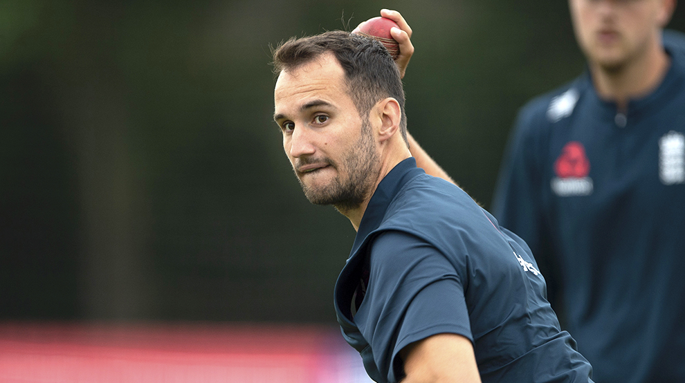 Lewis Gregory warming-up for England<br>credit: ECB Press Office