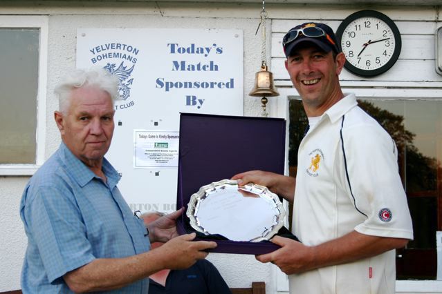 John Gauler (left) pictured in 2007 presenting a trophy to Yelverton captain Rob Guy