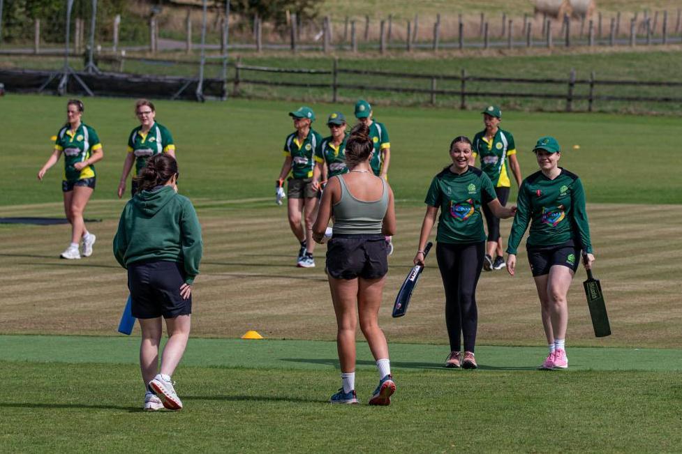 Layla Godfrey and Holsworthy captain, Becca Sharp, leave the field after setting a good score.