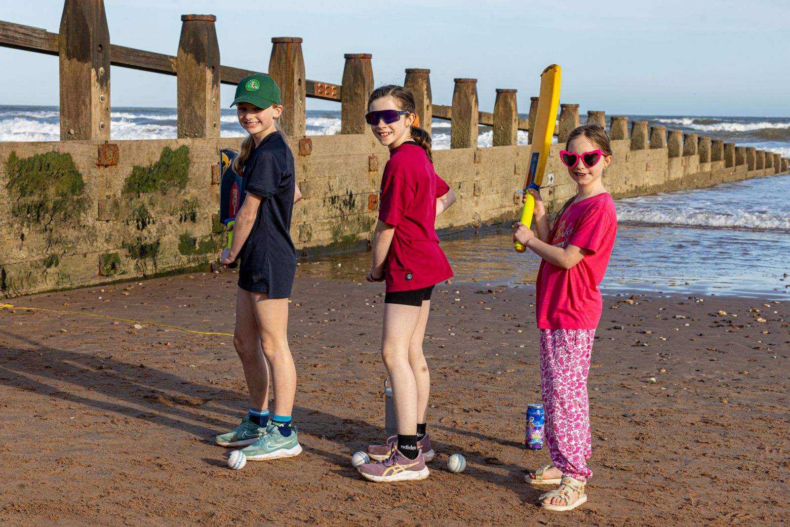 Mia at beach cricket with her Wicketz friends in Dawlish Warren.