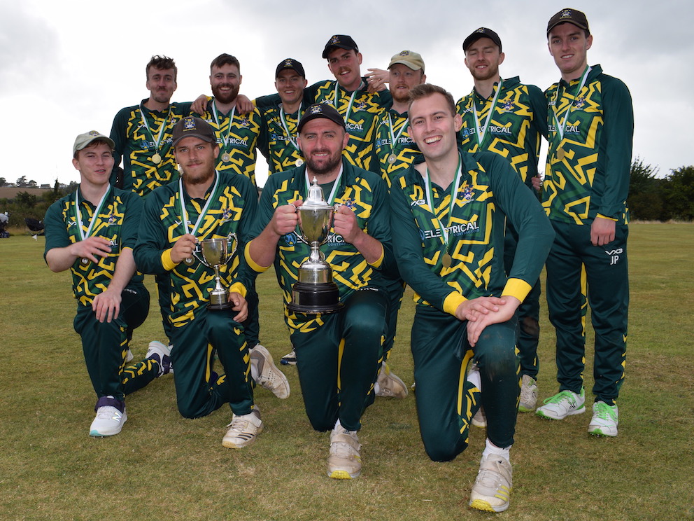 Bovey Tracey 2nd XI skipper Dan Green with the Aaron Printers Cup and his team