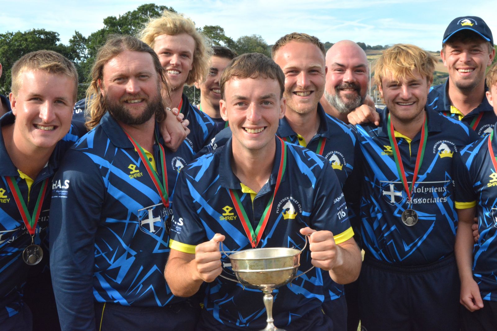 Plymstock captain Tom Mitch with team-mates and the Corinthian Cup<br>credit: Conrad Sutcliffe - no re-use without copyright owner's consent