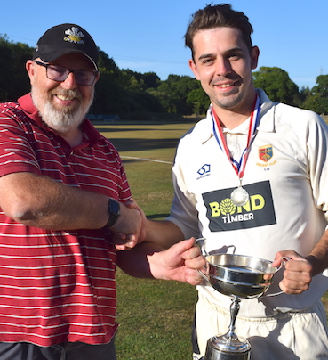 David Sheppard (league secretary) presents the Corinthian Cup to Tavistock captain Charlie Barriball